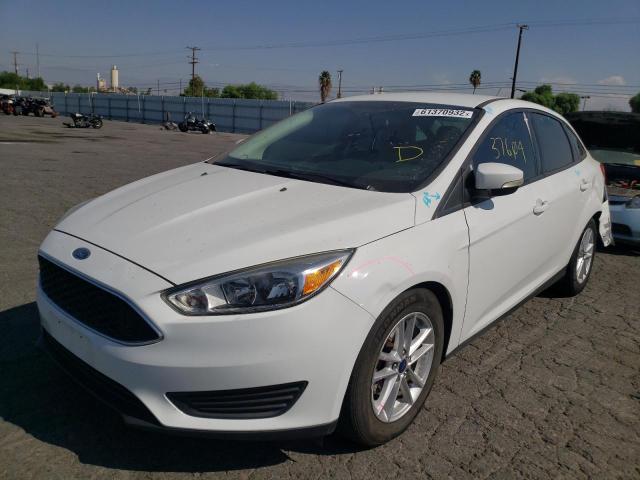 Photo 1 VIN: 1FADP3F2XGL329407 - FORD FOCUS SE 