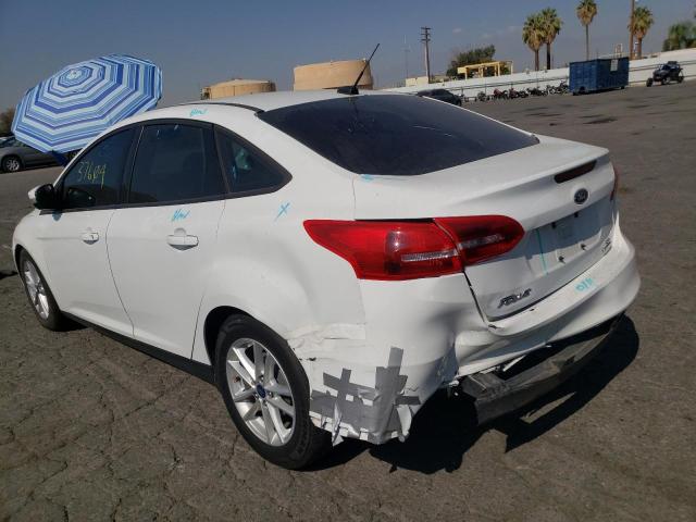 Photo 2 VIN: 1FADP3F2XGL329407 - FORD FOCUS SE 