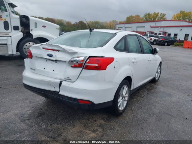 Photo 3 VIN: 1FADP3F2XGL335837 - FORD FOCUS 