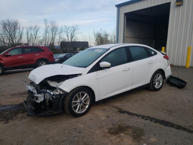 Photo 1 VIN: 1FADP3F2XGL337815 - FORD FOCUS SE 