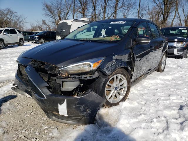 Photo 1 VIN: 1FADP3F2XGL346322 - FORD FOCUS SE 