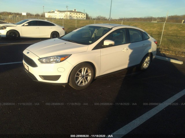 Photo 1 VIN: 1FADP3F2XGL348247 - FORD FOCUS 