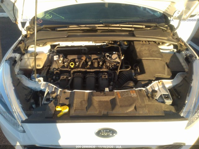 Photo 9 VIN: 1FADP3F2XGL348247 - FORD FOCUS 