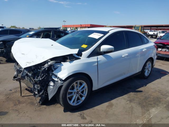 Photo 1 VIN: 1FADP3F2XGL348622 - FORD FOCUS 