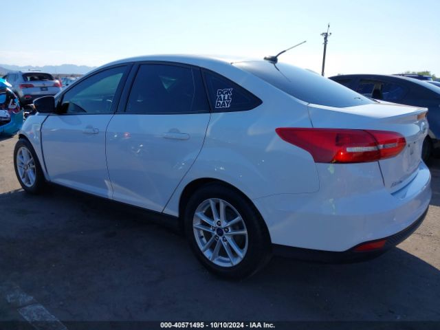 Photo 2 VIN: 1FADP3F2XGL348622 - FORD FOCUS 