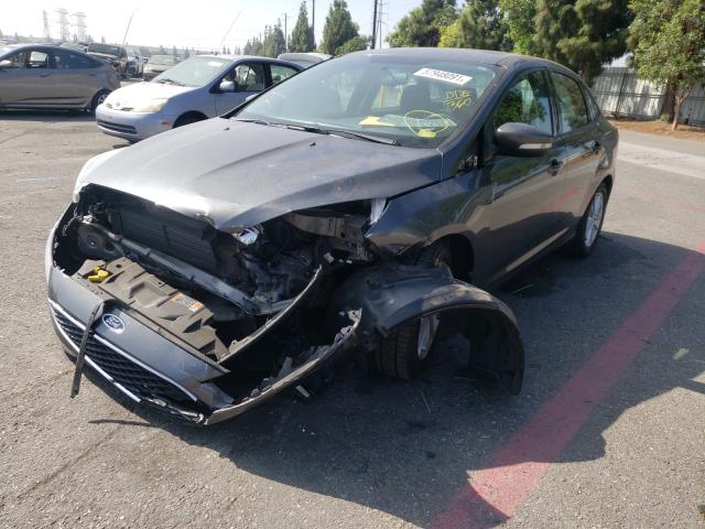 Photo 1 VIN: 1FADP3F2XGL362326 - FORD FOCUS SE 