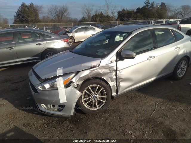 Photo 1 VIN: 1FADP3F2XGL371575 - FORD FOCUS 