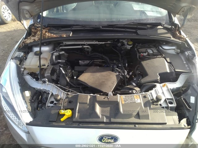 Photo 9 VIN: 1FADP3F2XGL371575 - FORD FOCUS 