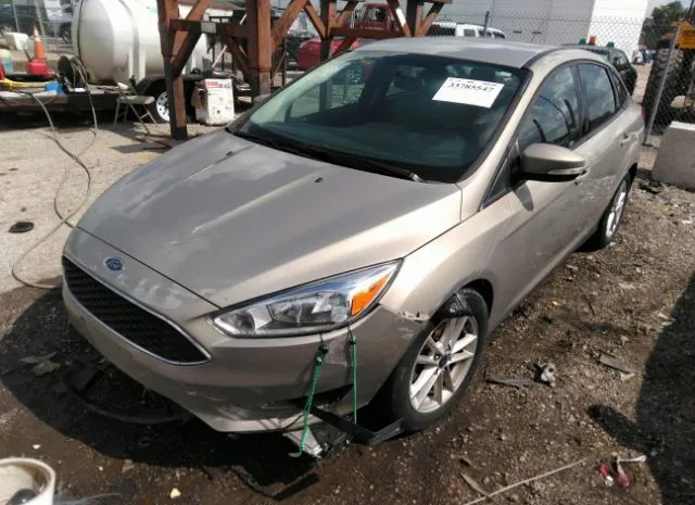 Photo 1 VIN: 1FADP3F2XGL378347 - FORD FOCUS 