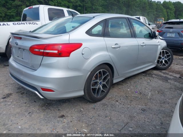 Photo 3 VIN: 1FADP3F2XGL382267 - FORD FOCUS 