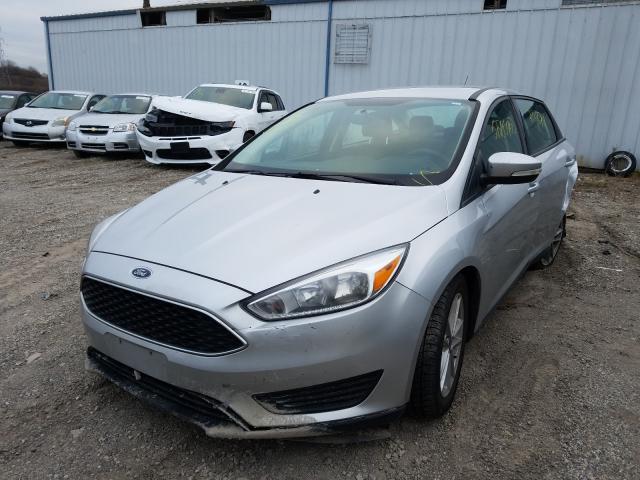 Photo 1 VIN: 1FADP3F2XGL382351 - FORD FOCUS SE 