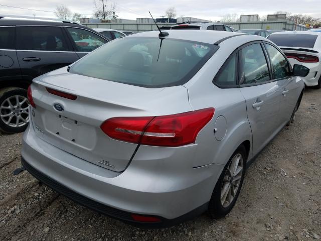 Photo 3 VIN: 1FADP3F2XGL382351 - FORD FOCUS SE 