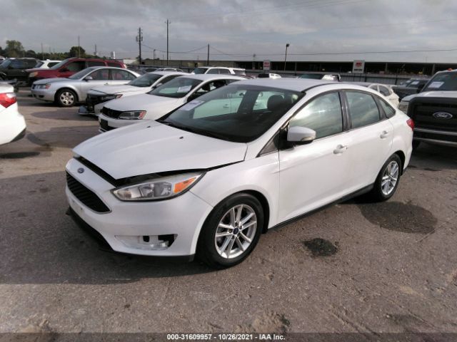 Photo 1 VIN: 1FADP3F2XGL389624 - FORD FOCUS 