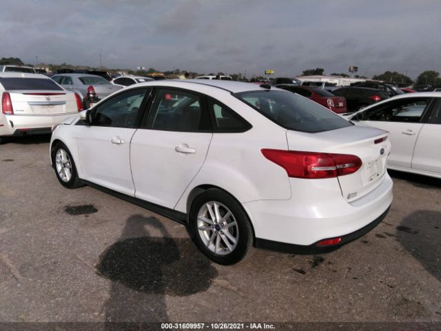 Photo 2 VIN: 1FADP3F2XGL389624 - FORD FOCUS 