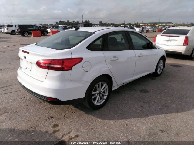 Photo 3 VIN: 1FADP3F2XGL389624 - FORD FOCUS 