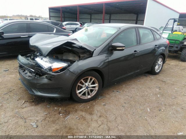 Photo 1 VIN: 1FADP3F2XGL392426 - FORD FOCUS 