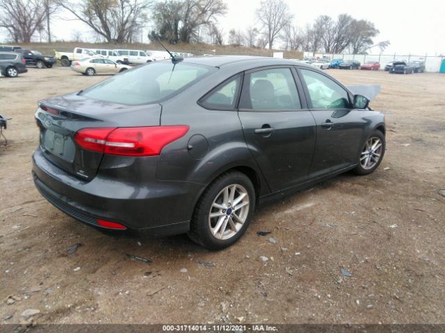 Photo 3 VIN: 1FADP3F2XGL392426 - FORD FOCUS 