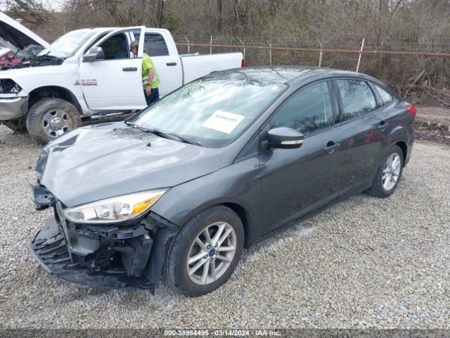 Photo 1 VIN: 1FADP3F2XGL398100 - FORD FOCUS 