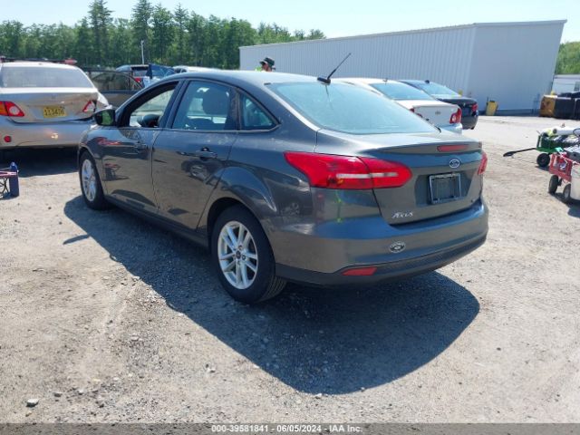 Photo 2 VIN: 1FADP3F2XGL406454 - FORD FOCUS 