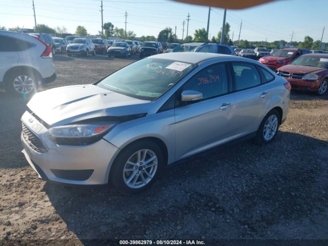 Photo 1 VIN: 1FADP3F2XGL406678 - FORD FOCUS 