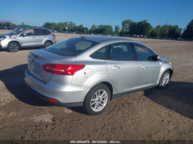 Photo 3 VIN: 1FADP3F2XGL406678 - FORD FOCUS 