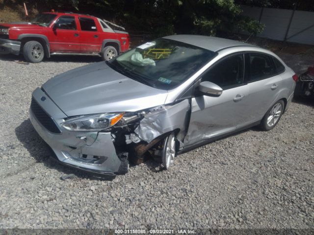 Photo 1 VIN: 1FADP3F2XHL203520 - FORD FOCUS 