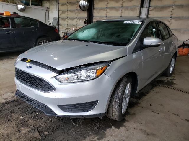 Photo 1 VIN: 1FADP3F2XHL304704 - FORD FOCUS SE 