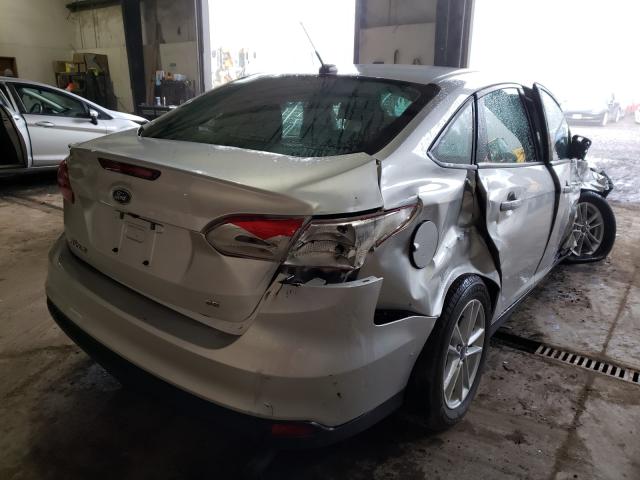 Photo 3 VIN: 1FADP3F2XHL304704 - FORD FOCUS SE 