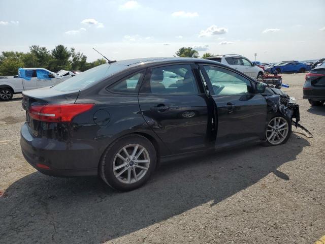 Photo 2 VIN: 1FADP3F2XHL322099 - FORD FOCUS SE 