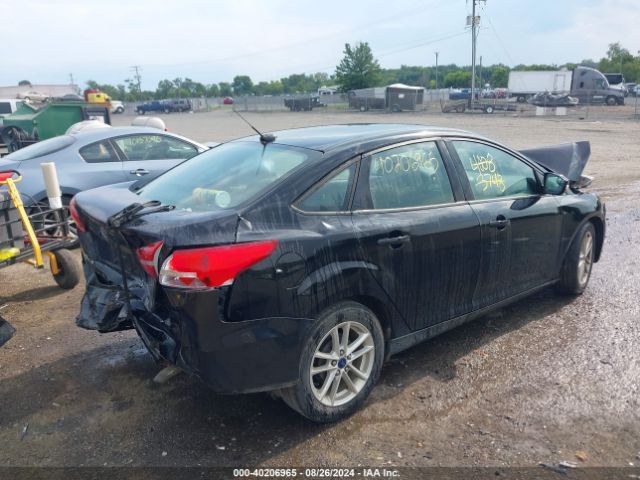 Photo 3 VIN: 1FADP3F2XHL323172 - FORD FOCUS 