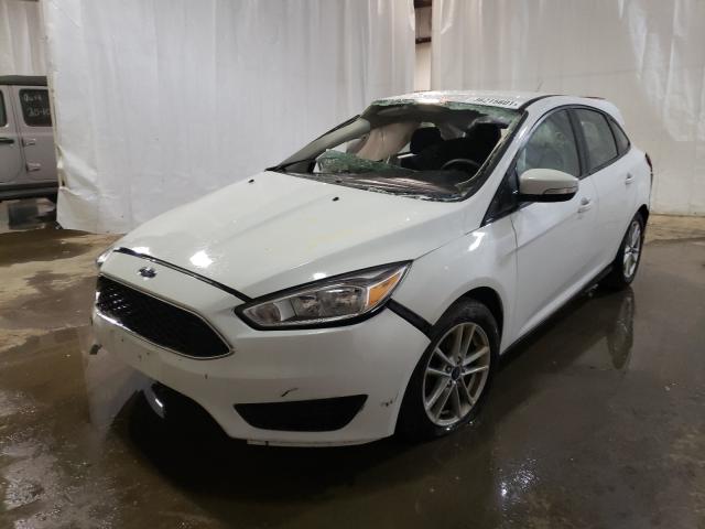 Photo 1 VIN: 1FADP3F2XHL335810 - FORD FOCUS SE 