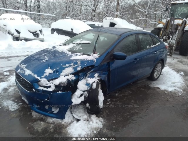 Photo 1 VIN: 1FADP3F2XJL203068 - FORD FOCUS 