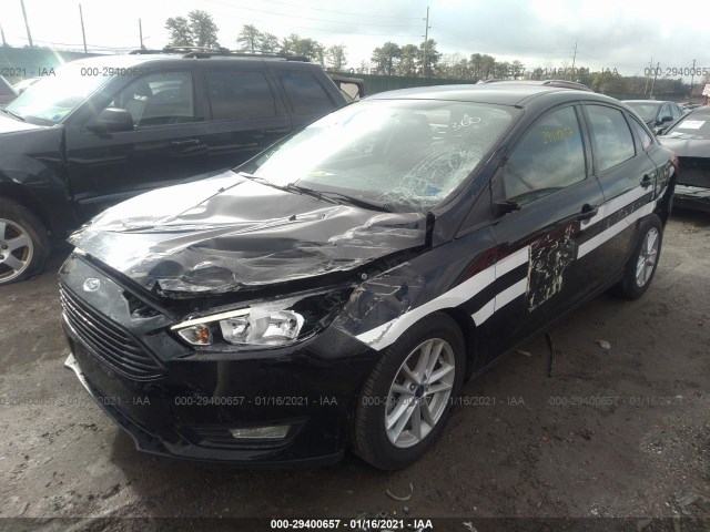 Photo 1 VIN: 1FADP3F2XJL208190 - FORD FOCUS 