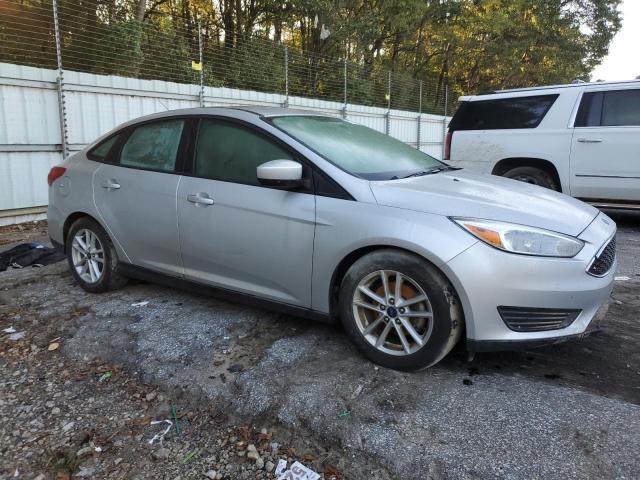 Photo 3 VIN: 1FADP3F2XJL214247 - FORD FOCUS SE 