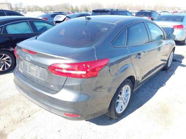 Photo 3 VIN: 1FADP3F2XJL214510 - FORD FOCUS SE 