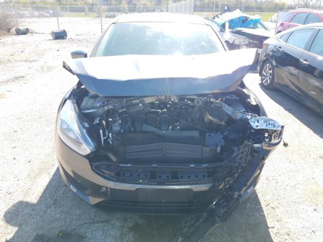 Photo 8 VIN: 1FADP3F2XJL214510 - FORD FOCUS SE 