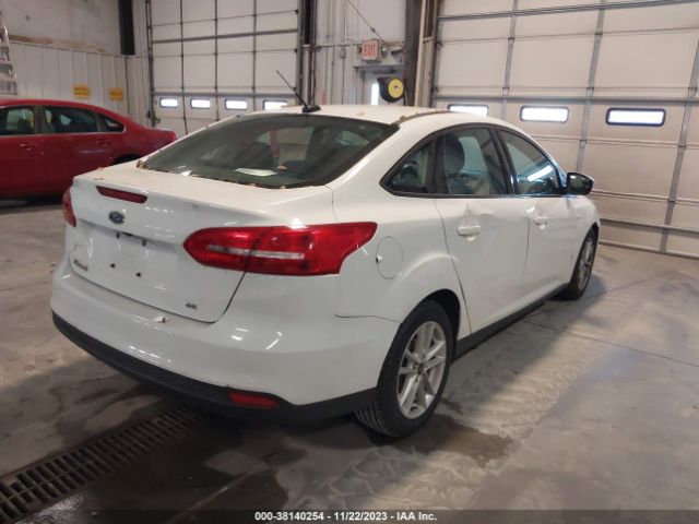 Photo 3 VIN: 1FADP3F2XJL231615 - FORD FOCUS 