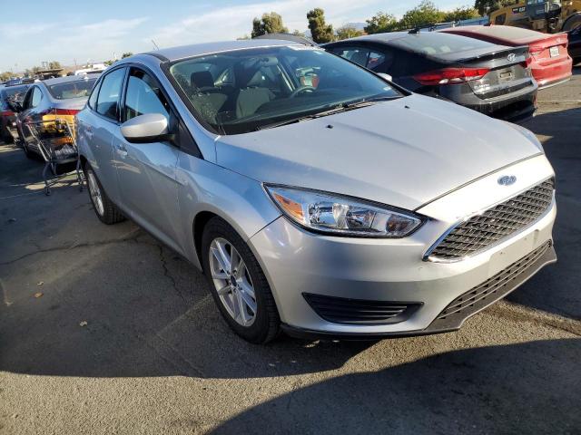 Photo 3 VIN: 1FADP3F2XJL236989 - FORD FOCUS 