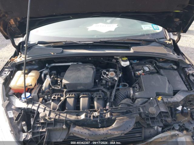 Photo 9 VIN: 1FADP3F2XJL237575 - FORD FOCUS 