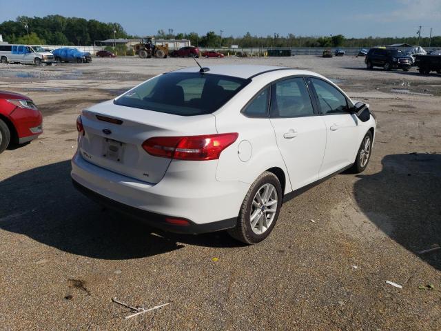 Photo 2 VIN: 1FADP3F2XJL245420 - FORD FOCUS SE 