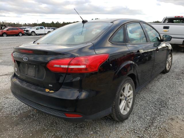 Photo 3 VIN: 1FADP3F2XJL255350 - FORD FOCUS SE 