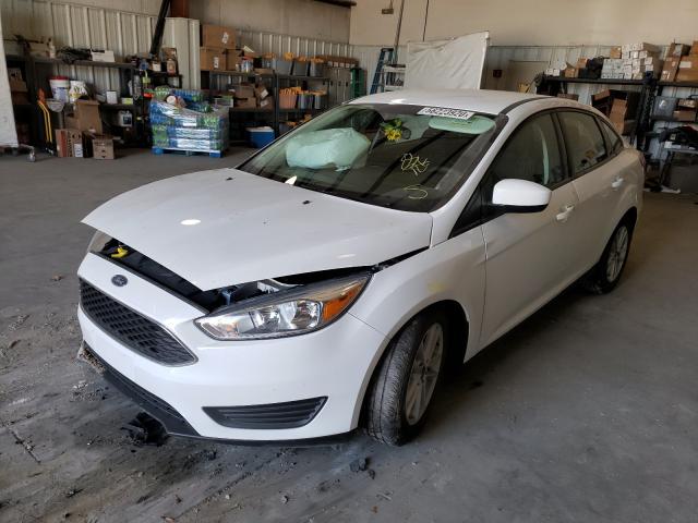 Photo 1 VIN: 1FADP3F2XJL265070 - FORD FOCUS SE 