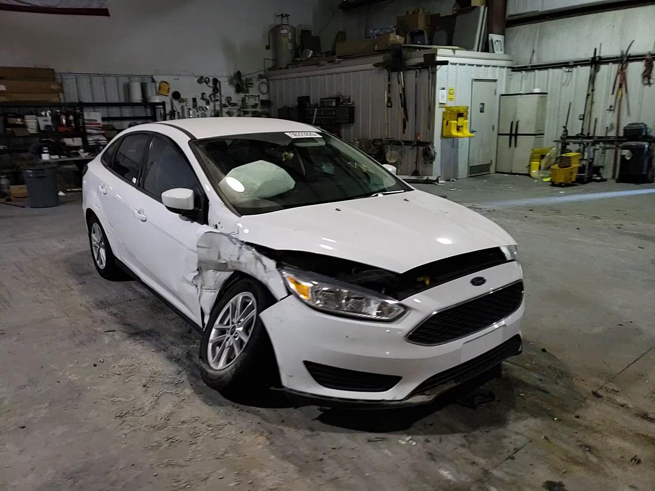 Photo 10 VIN: 1FADP3F2XJL265070 - FORD FOCUS SE 