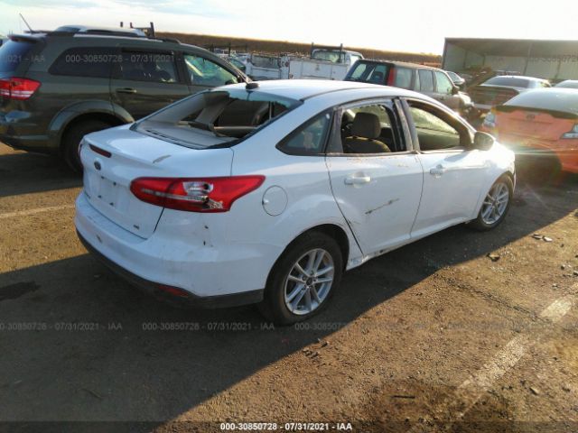 Photo 3 VIN: 1FADP3F2XJL280815 - FORD FOCUS 