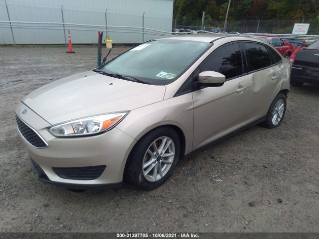 Photo 1 VIN: 1FADP3F2XJL291832 - FORD FOCUS 