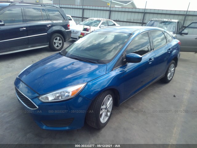 Photo 1 VIN: 1FADP3F2XJL292897 - FORD FOCUS 