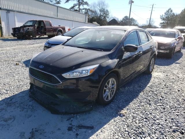 Photo 1 VIN: 1FADP3F2XJL307334 - FORD FOCUS 