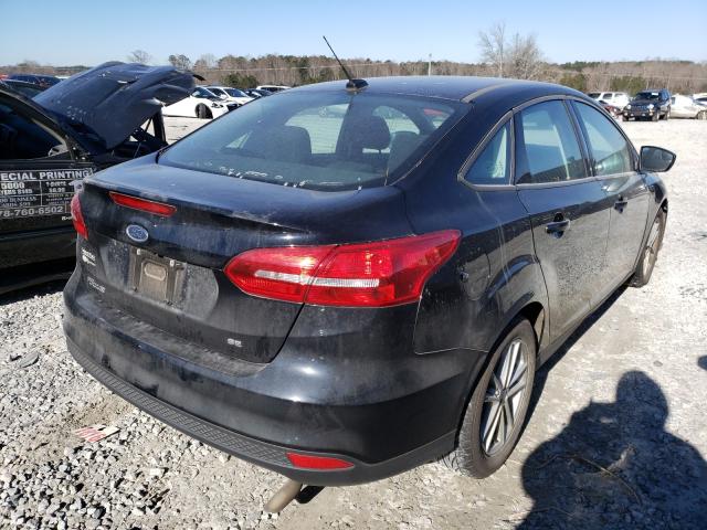 Photo 3 VIN: 1FADP3F2XJL307334 - FORD FOCUS 