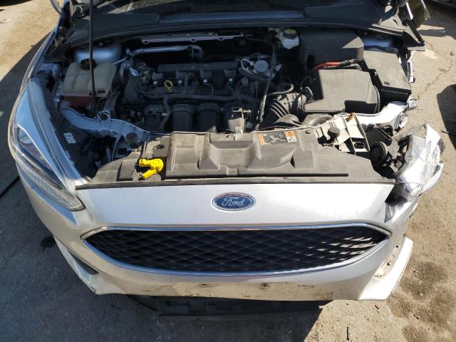 Photo 10 VIN: 1FADP3F2XJL312128 - FORD FOCUS SE 