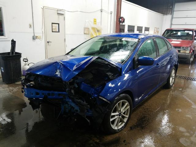 Photo 1 VIN: 1FADP3F2XJL312730 - FORD FOCUS SE 